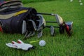 Golf glove , white golf ball on tee in a beautiful golf course Royalty Free Stock Photo