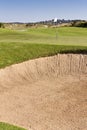 Golf green on course with bunker Royalty Free Stock Photo