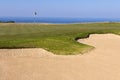 Golf green and bunker Royalty Free Stock Photo