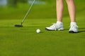 Golf hit on green Royalty Free Stock Photo