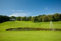 Golf landscape with a pond Royalty Free Stock Photo