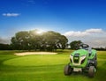A lawn tractor mows Royalty Free Stock Photo