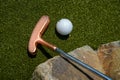 golf mallet on the green, artificial turf Royalty Free Stock Photo