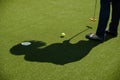 golf mallet on the green, artificial turf Royalty Free Stock Photo