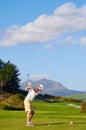 Golf man teeing off Royalty Free Stock Photo