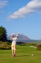 Golf man teeing off Royalty Free Stock Photo