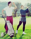 Golf partners playing together