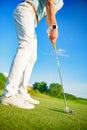 Golf player holding clud Royalty Free Stock Photo