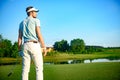 Golf player holding driver Royalty Free Stock Photo