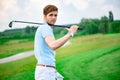 Golf player holding driver Royalty Free Stock Photo