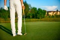 Golf player holding driver Royalty Free Stock Photo