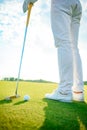 Golf player holding driver Royalty Free Stock Photo