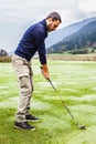 Golf player in the morning Royalty Free Stock Photo