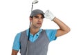 Golf player posing with golf club Royalty Free Stock Photo