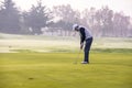 Golf player preparing to shot Royalty Free Stock Photo