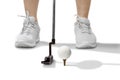 Golf player with putter golf club ready to hit the ball Royalty Free Stock Photo