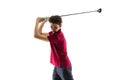 Golf player in a red shirt taking a swing isolated on white studio background Royalty Free Stock Photo