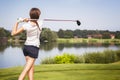 Golf player teeing off Royalty Free Stock Photo