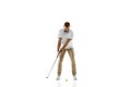 Golf player in a white shirt practicing, playing isolated on white studio background Royalty Free Stock Photo