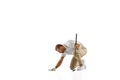 Golf player in a white shirt practicing, playing isolated on white studio background Royalty Free Stock Photo