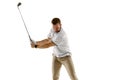 Golf player in a white shirt taking a swing isolated on white studio background Royalty Free Stock Photo