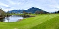 Golf resort with mountains Royalty Free Stock Photo