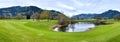 Golf resort with mountains Royalty Free Stock Photo