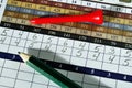Golf Score Card with Red Tee and Green Pencil