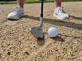 Golf shot from sand bunker golfer hitting ball from danger Royalty Free Stock Photo