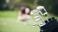 Golf, sports and golfing club in bag on course for game, practice and training for competition. Professional golfer Royalty Free Stock Photo