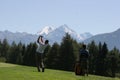 Golf swing in Crans-Montana Royalty Free Stock Photo