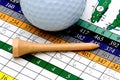 Golf tee, ball and scorecard