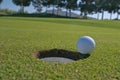 Golf unsunk putt on the lip