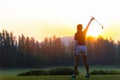 Golf women. Cheerful happy asian smiling woman with playing golf in the golf club Royalty Free Stock Photo