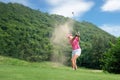 Golf women. Cheerful happy asian smiling woman with playing golf in the golf club in the sunny time, copy space