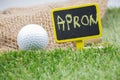 Golf wording term sign with golf ball are on green grass