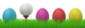 Golfball between easter eggs