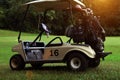 Golfcar in beautiful golf course in the evening golf course with sunshine Royalty Free Stock Photo