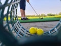 Golfer child on practice mat during golf lesson Royalty Free Stock Photo