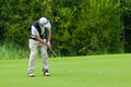 Golfer finishes his swing