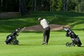 Golfer finishes his swing