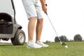 Golfer getting ready to hit the ball Royalty Free Stock Photo