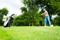 Golfer getting ready to hit the drive Royalty Free Stock Photo