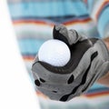 Golfer giving golf ball