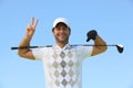 Golfer giving peace sign