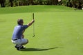 Golfer on the green Royalty Free Stock Photo