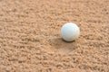 Golfer hit Golf ball on sand trap bunker at golf courses Royalty Free Stock Photo