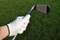 Golfer Holding an Iron (Golf Club)
