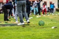 Golfer legs at golf tournament practice swing with golf club Royalty Free Stock Photo