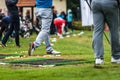 Golfer legs at golf tournament practice swing with golf club Royalty Free Stock Photo